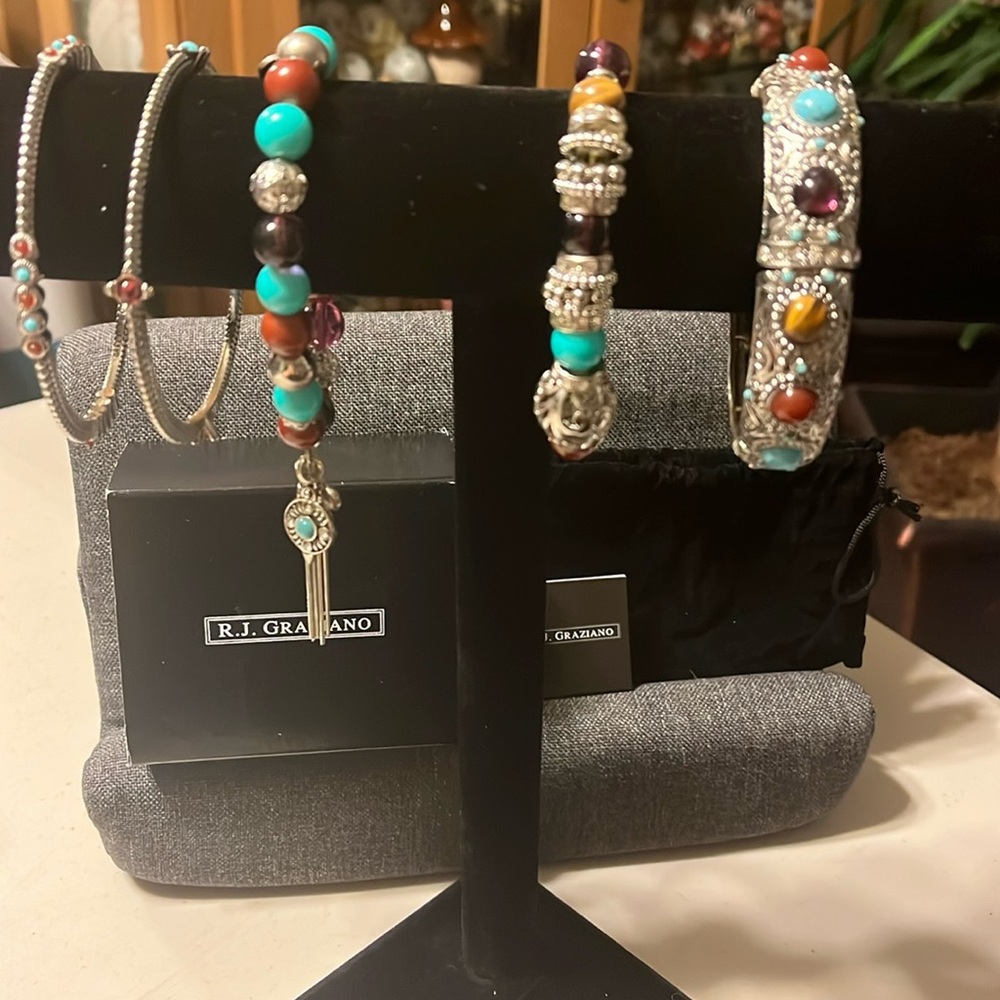 Five bracelets by RJ Graziano brand new never been worn in bags and in their box